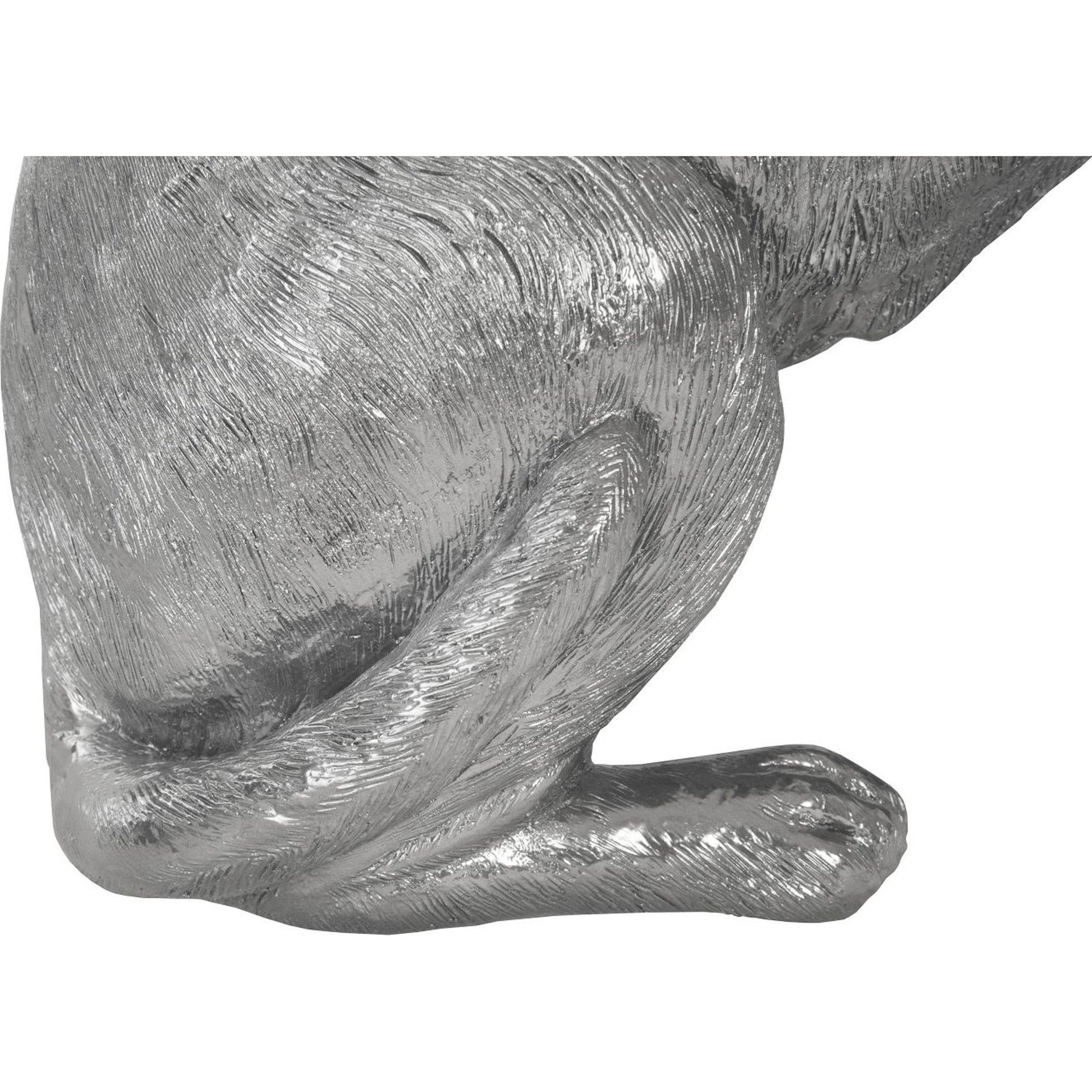 Labrador by Phillips Collection in silver and liquid silver. Made from resin in a transitional style.