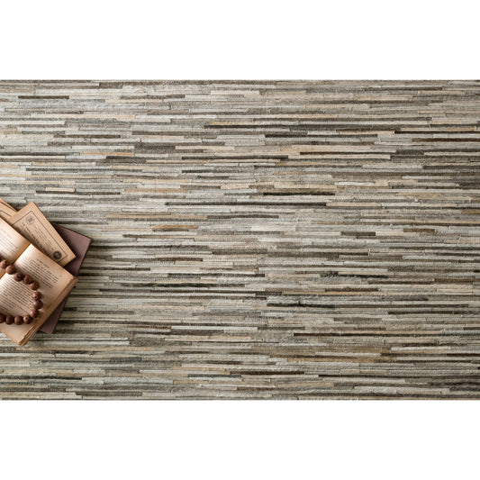 Promenade PO-06 Rug by Loloi in silver. Made from 100% cowhide in a modern style.