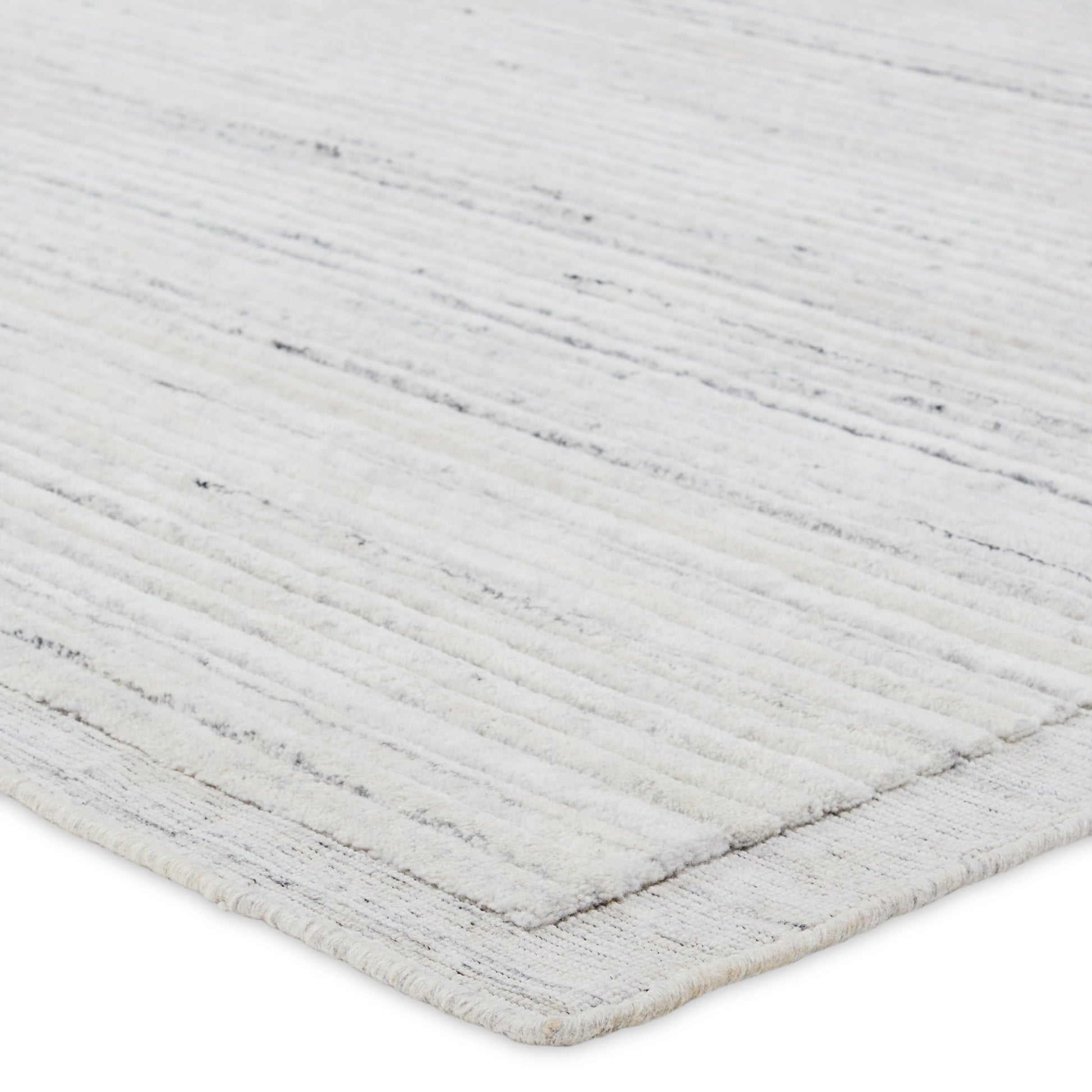 Racka RAC01 Rug by Jaipur Living in ivory, gray. Made from 100% pet yarn in a unique style.