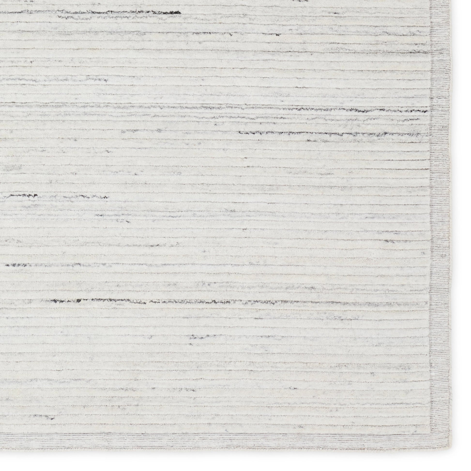 Racka RAC01 Rug by Jaipur Living in ivory, gray. Made from 100% pet yarn in a unique style.