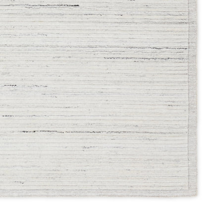 Racka RAC01 Rug by Jaipur Living in ivory, gray. Made from 100% pet yarn in a unique style.