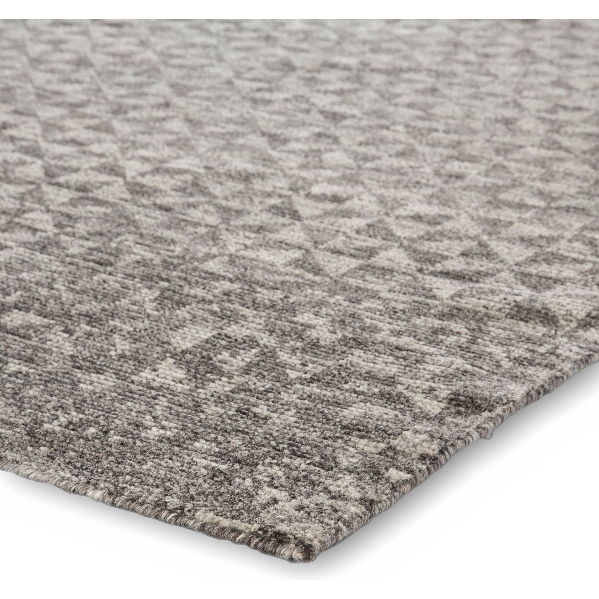 Rize RIZ03 Rug by Jaipur Living in dark gray. Made from 100% wool in a unique style.