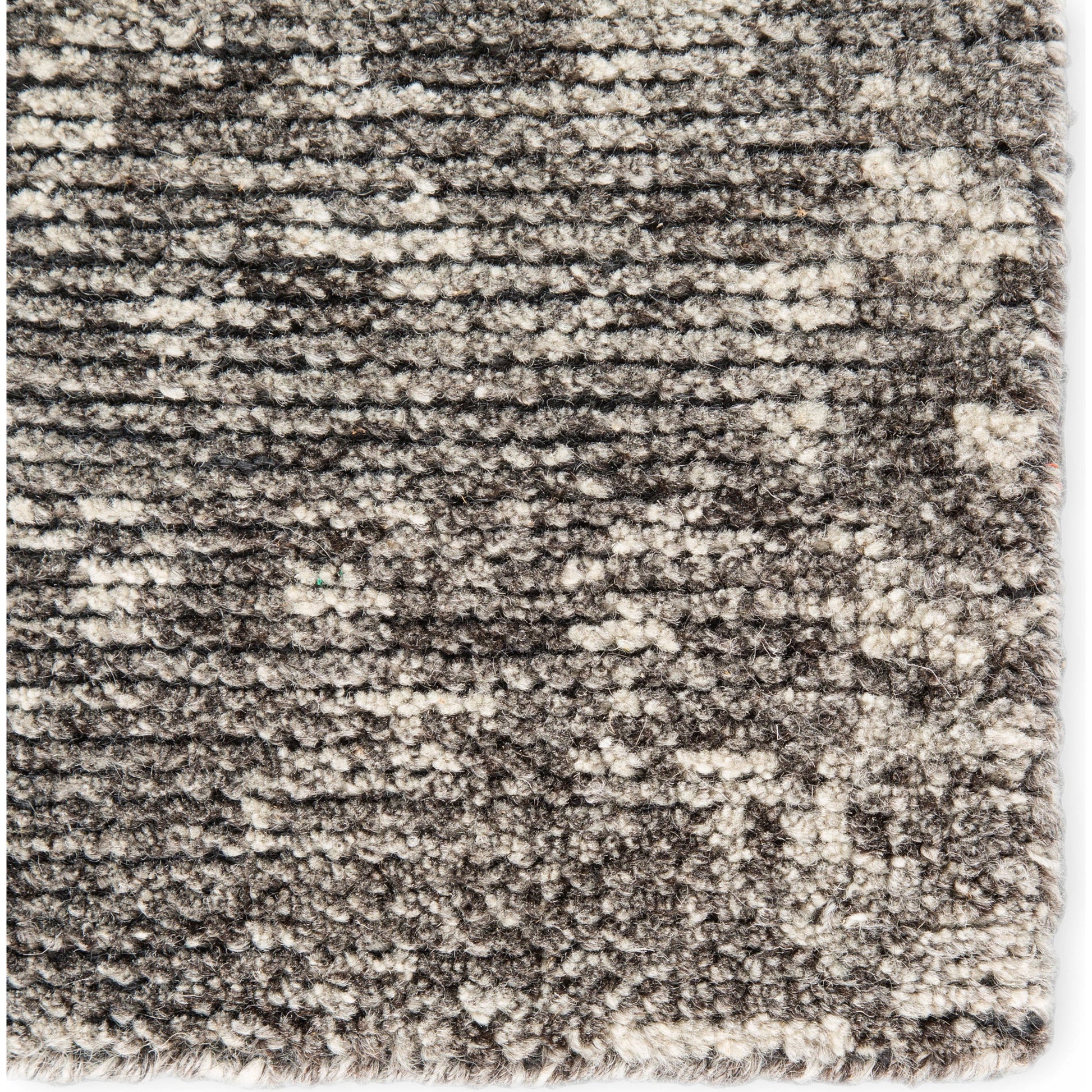 Rize RIZ03 Rug by Jaipur Living in dark gray. Made from 100% wool in a unique style.
