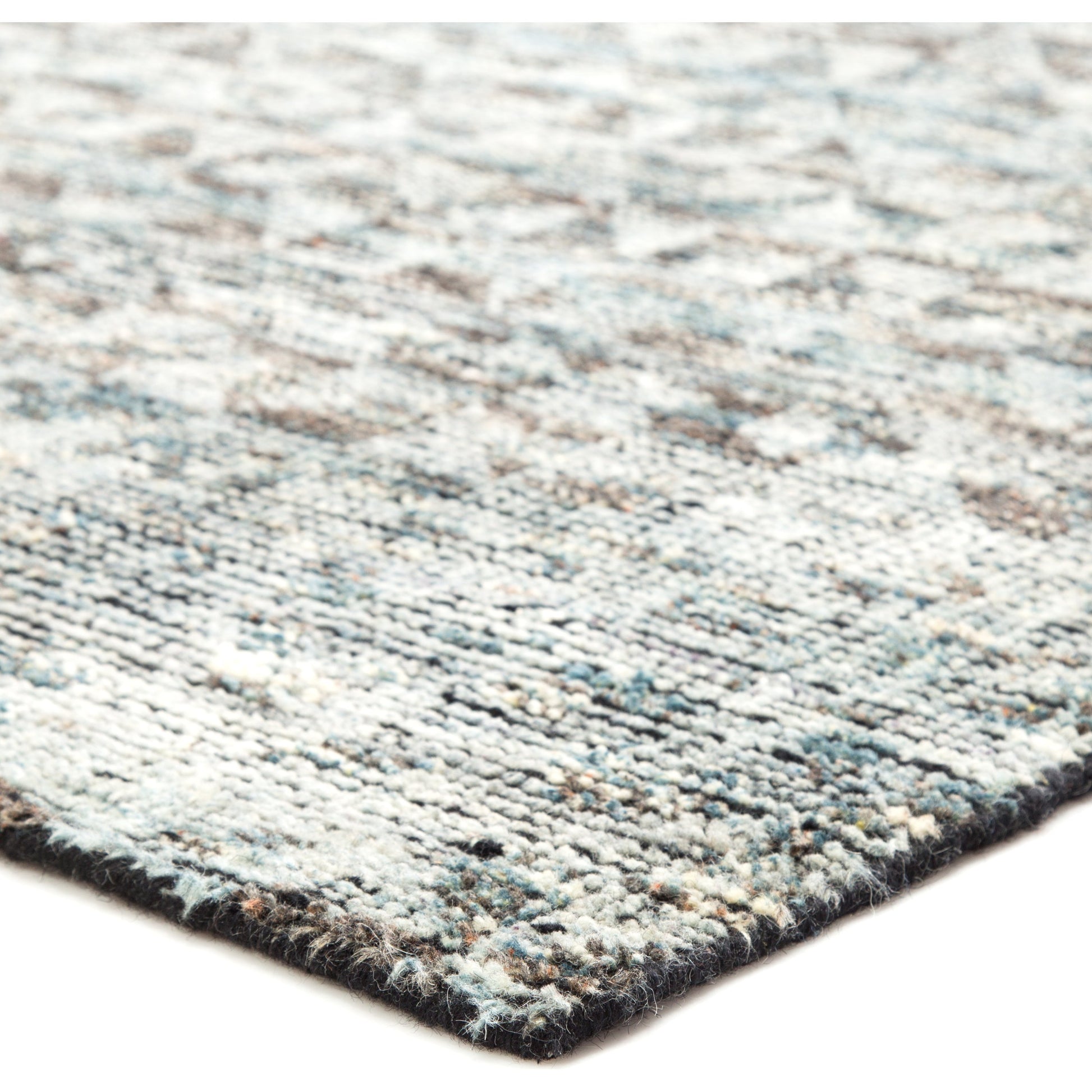 Rize RIZ03 Rug by Jaipur Living in dark gray. Made from 100% wool in a unique style.