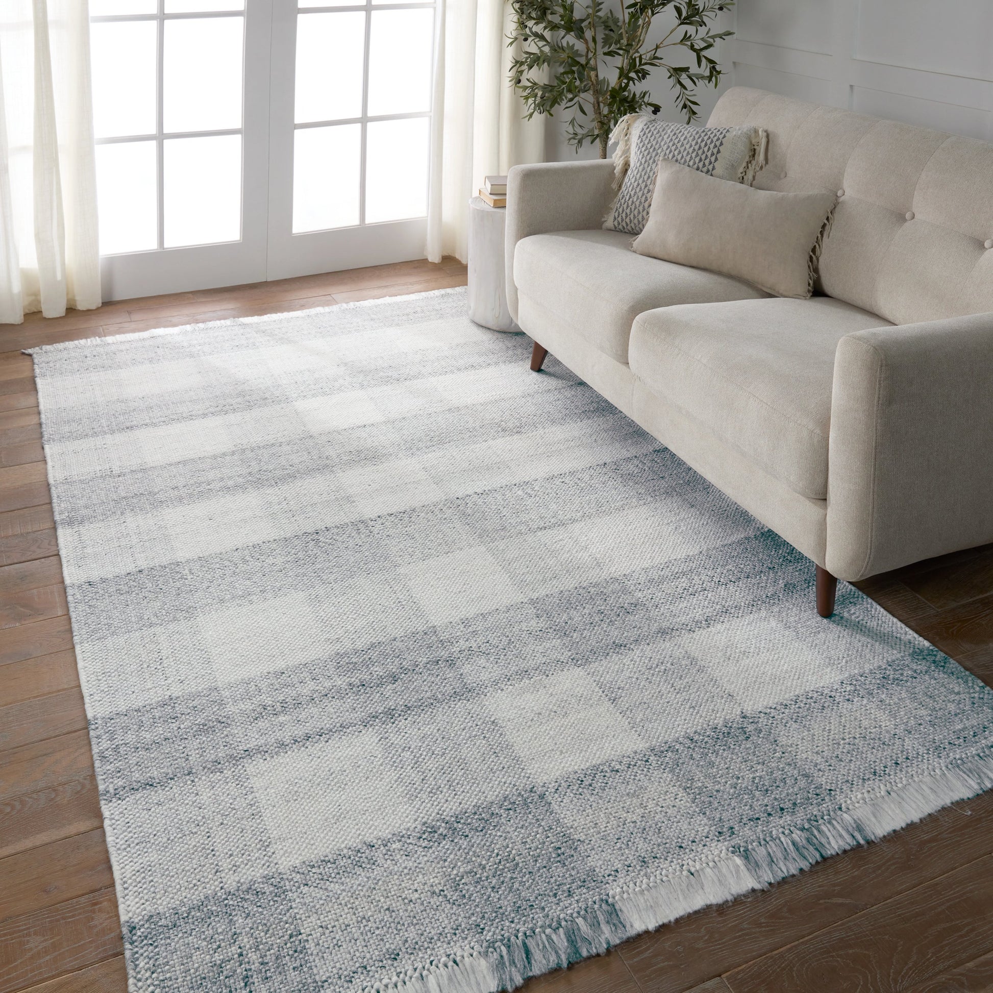 Respite RSP02 Rug by Jaipur Living in gray, ivory. Made from 100% polyester in a unique style.