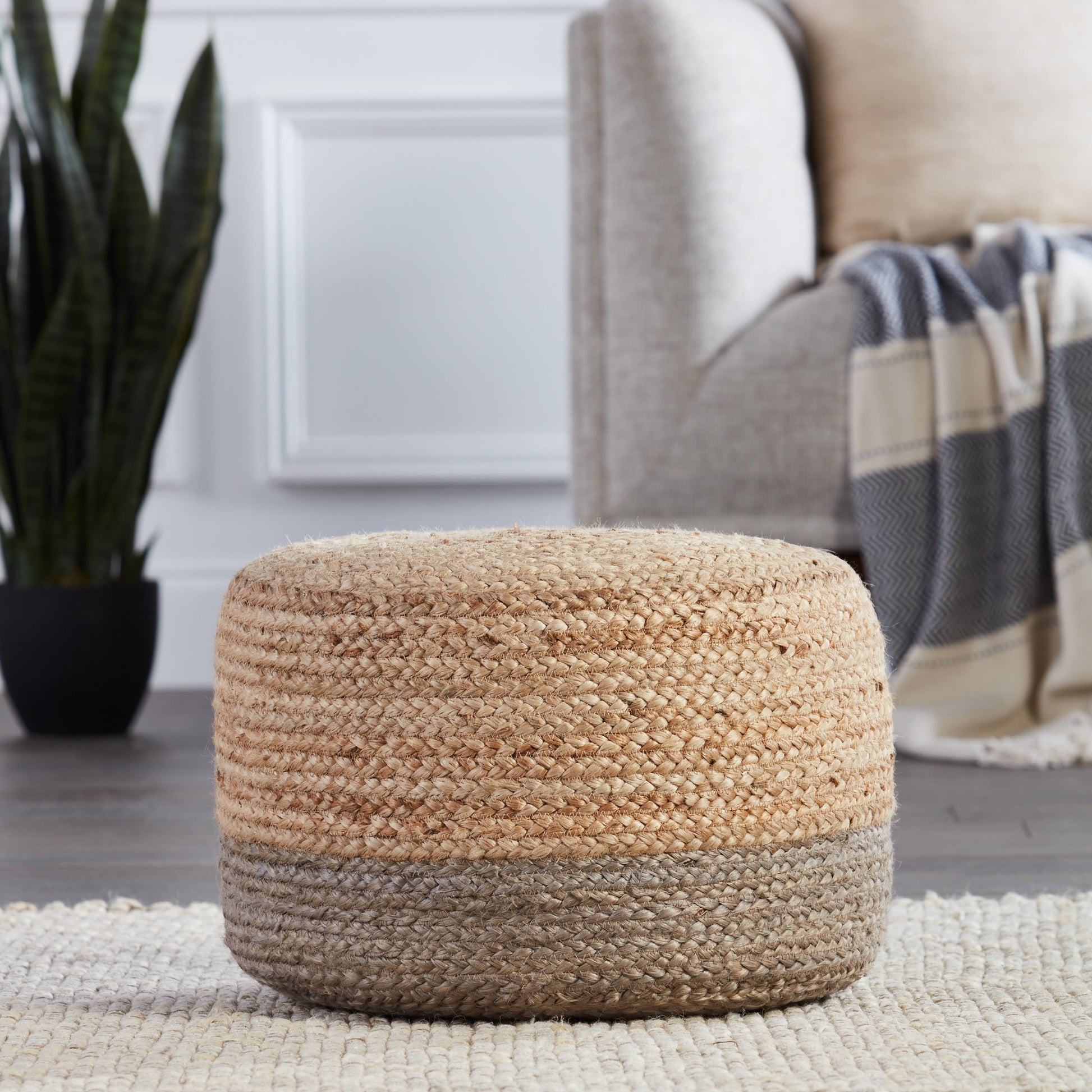 Saba Oliana Pouf by Jaipur Living. Made from 100% jute in a coastal style.