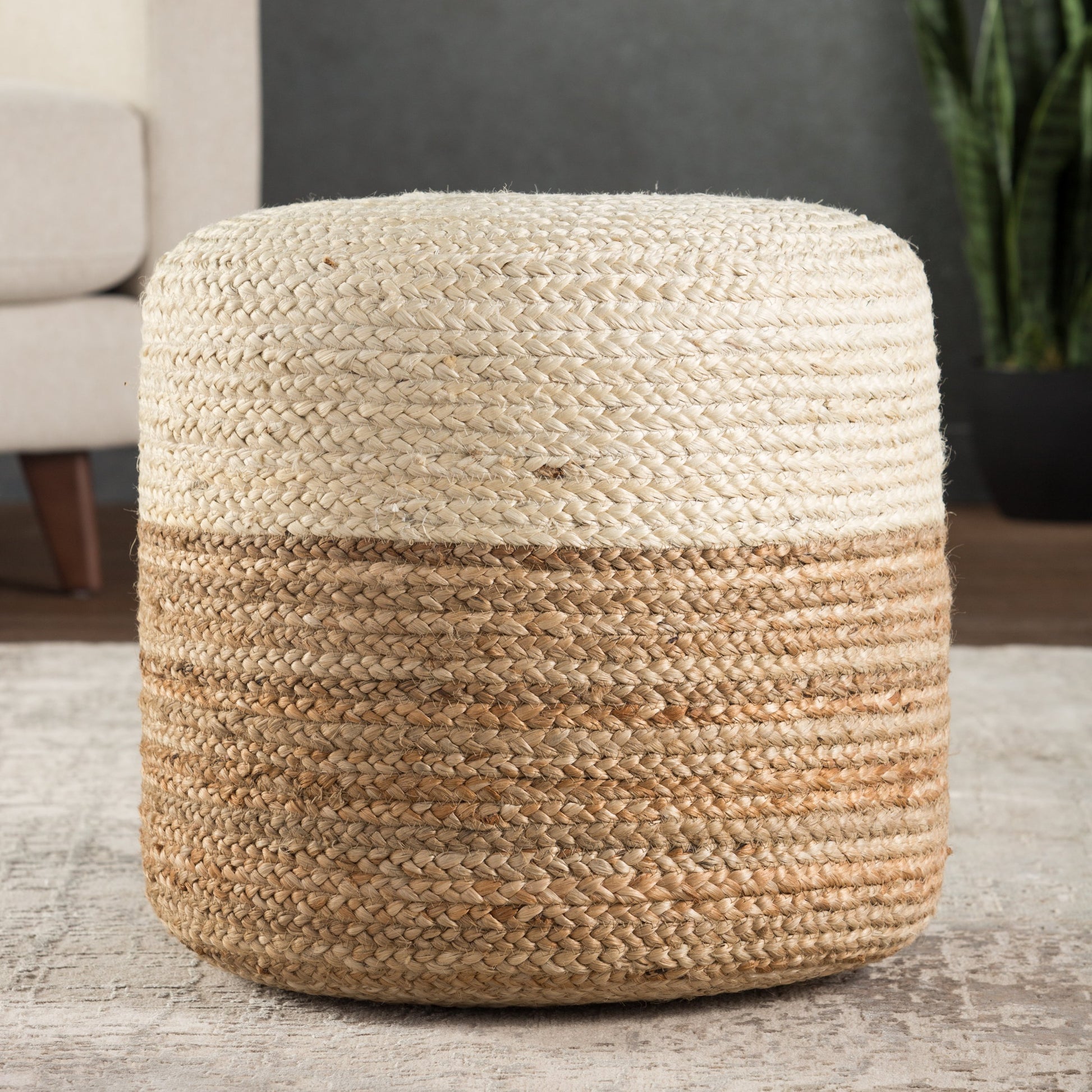 Saba Oliana 18" Pouf by Jaipur Living. Made from 100% jute in a coastal style.