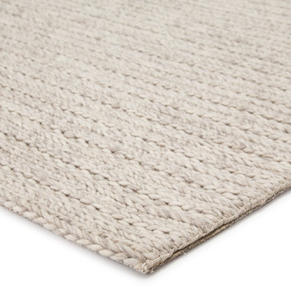 Scandinavia Rakel SCR14 Rug by Jaipur Living in cream, light gray. Made from 100% wool in a unique style.