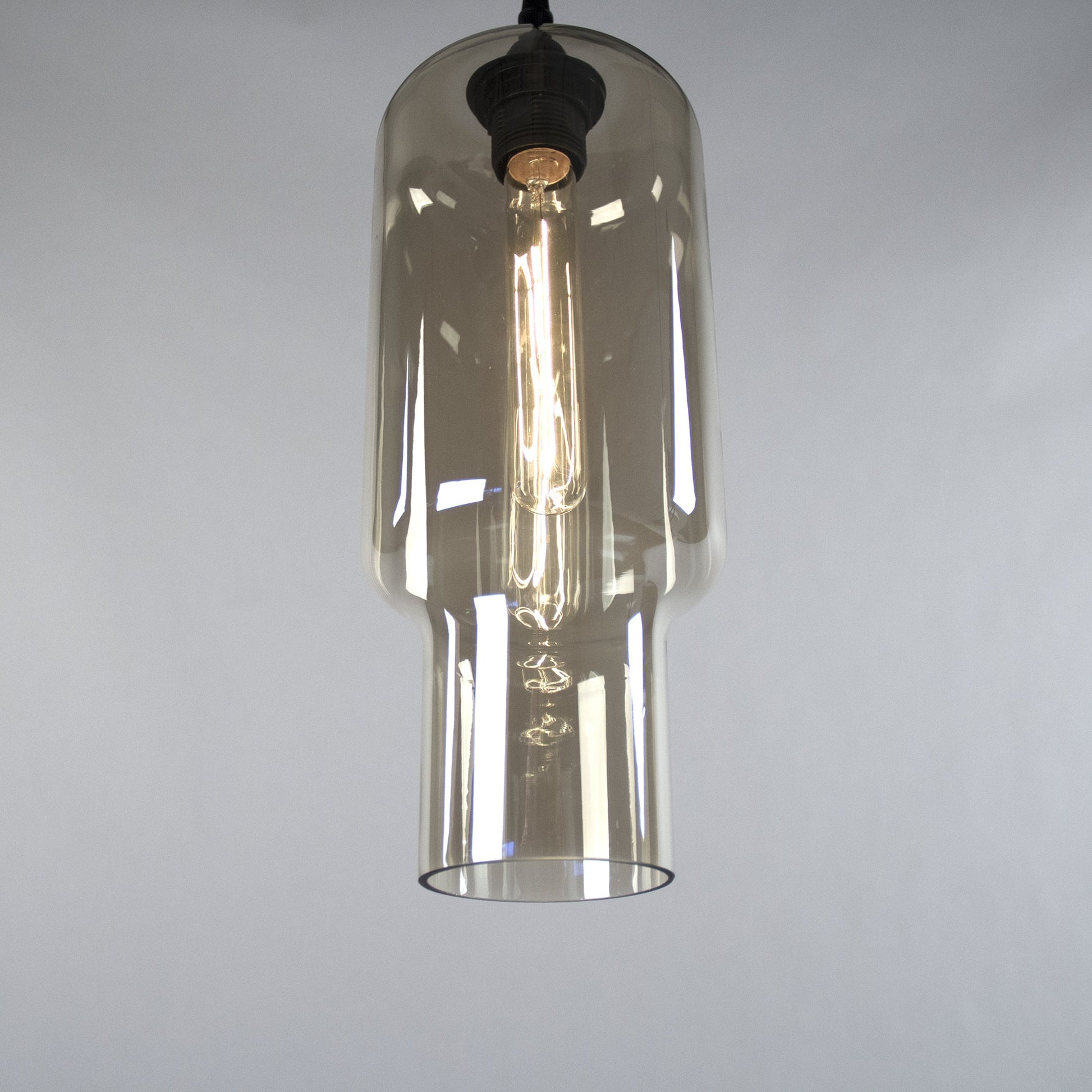 Aiden Hanging Light by Zentique in tinted gray and glass. Made from metal, smoky glass in a modern style.