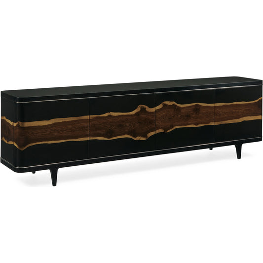 Naturalist Entertain Console by Caracole in black, oak, bronze and piano black, signature natural oak, deep bronze. Made from birch solids, maple solids, stainless steel, live edge fumed oak veneer in a modern style.
