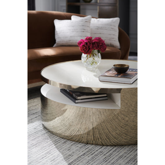 Turn Style by Caracole in gold and whisper of gold. Made from metal, stone in a modern style.