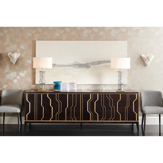 The Skyline Credenza by Caracole in ebony and modern ebony, french brass. Made from hardwood solids, ebony macassar veneers, brass in a modern style.