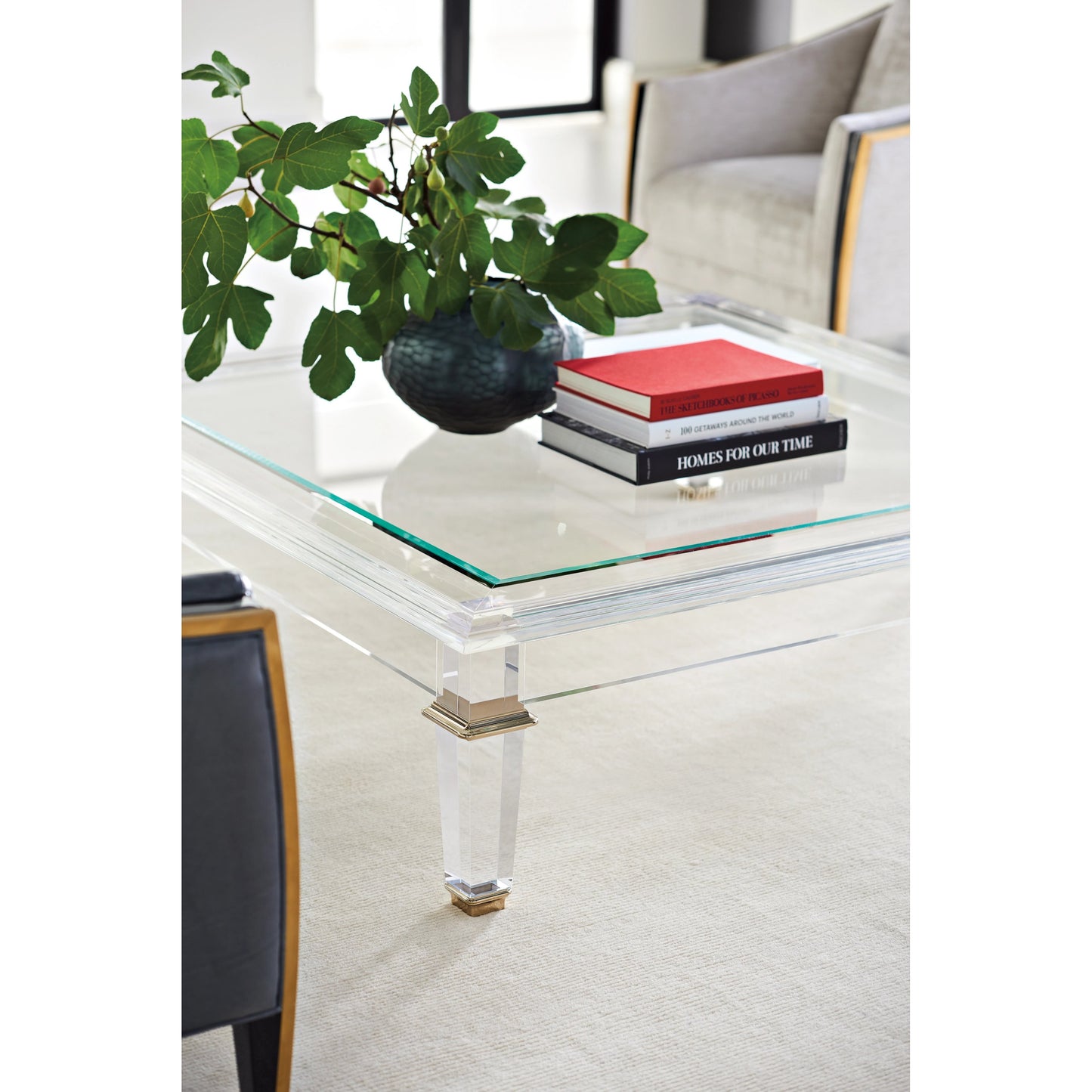 004 SI-1955933 | Lifestyle | Pierre Cocktail Table by Caracole in acrylic and majestic gold. Made from acrylic, brass in a modern style.