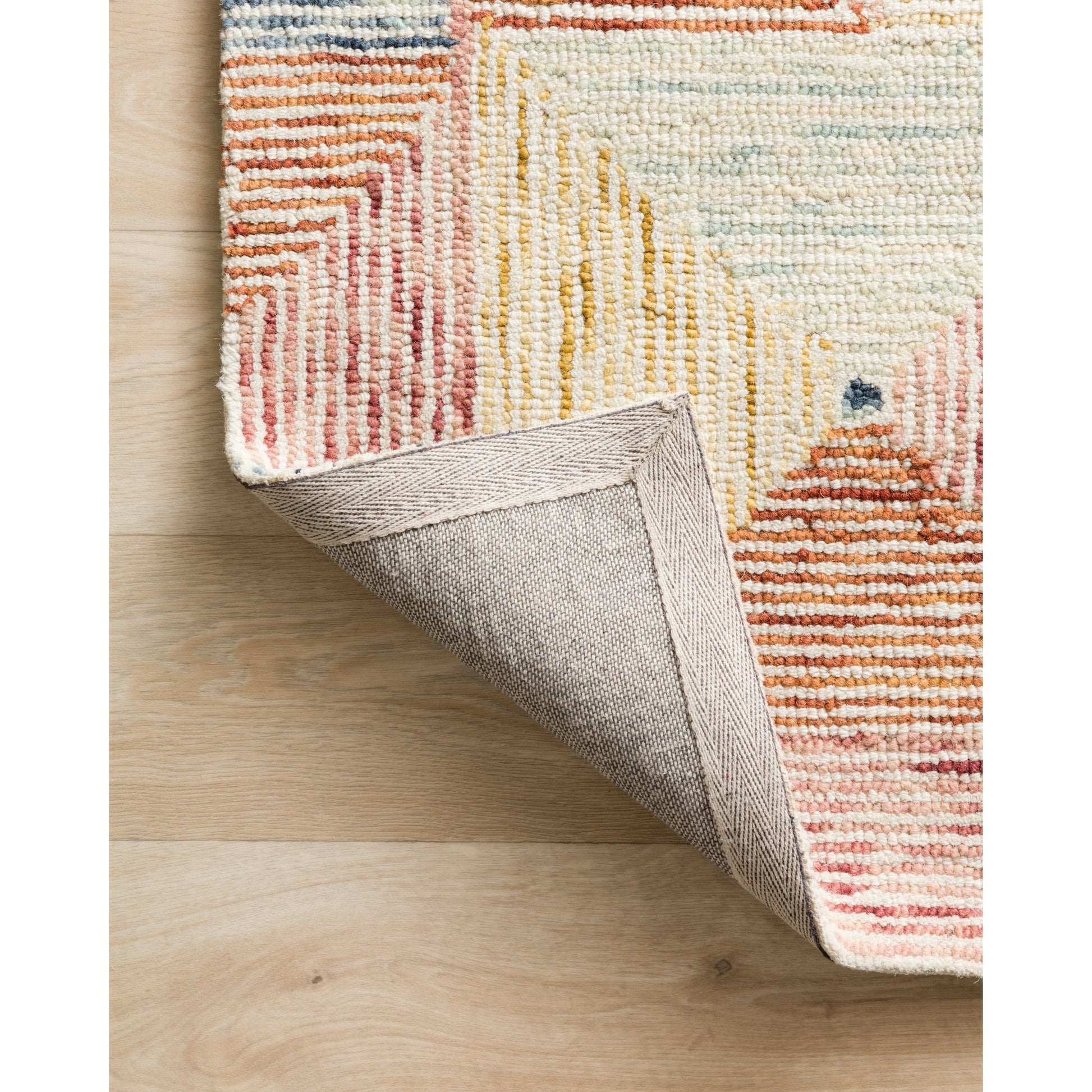 SPE-01 by Loloi II. Made from 100% wool in a rustic style.