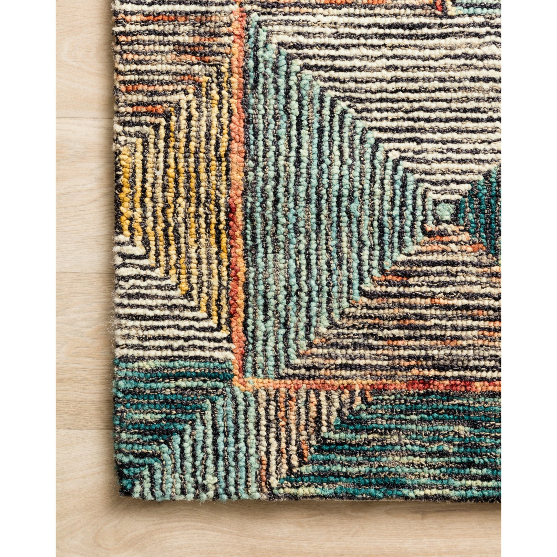SPE-01 by Loloi II. Made from 100% wool in a rustic style.
