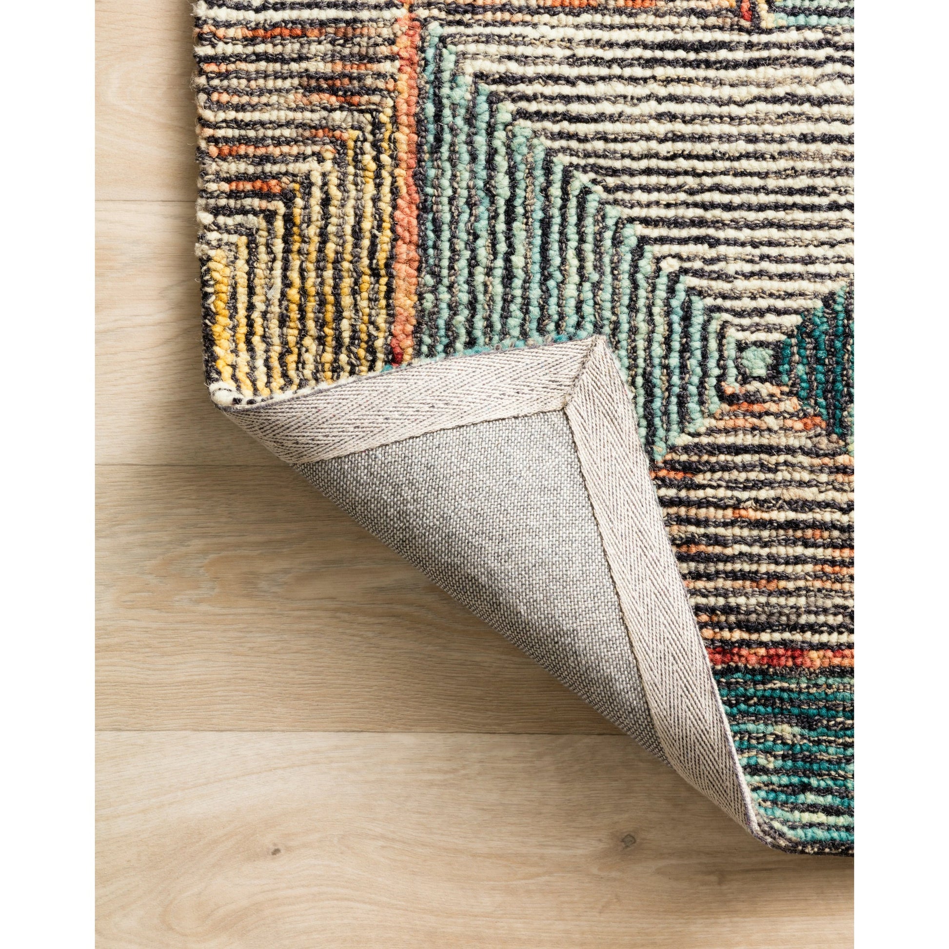 SPE-01 by Loloi II. Made from 100% wool in a rustic style.