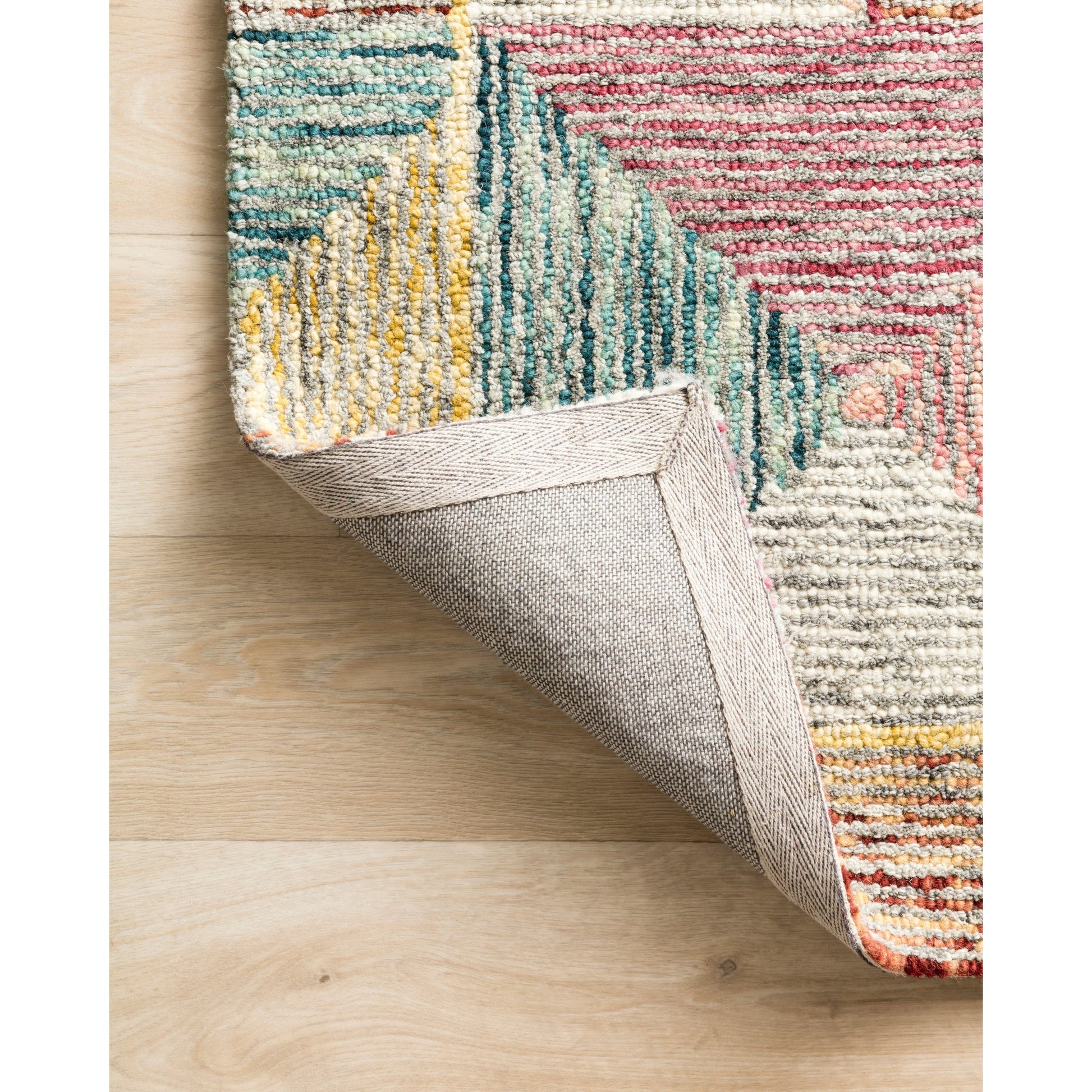 SPE-01 by Loloi II. Made from 100% wool in a rustic style.