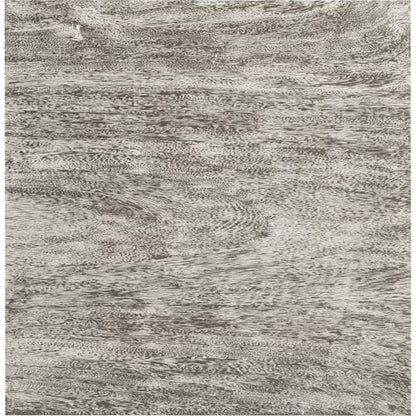 Geometry Side Table by Phillips Collection in gray stone. Made from wood in a rustic style.