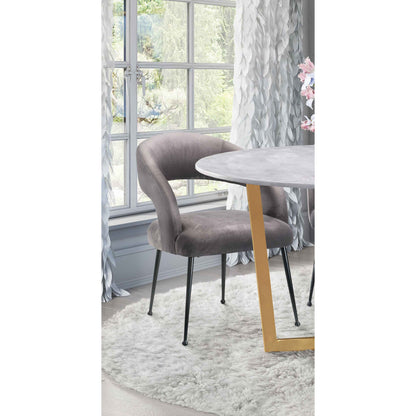 Rocco Dining Chair by TOV Furniture. Made from velvet, pine, stainless steel in a modern style.