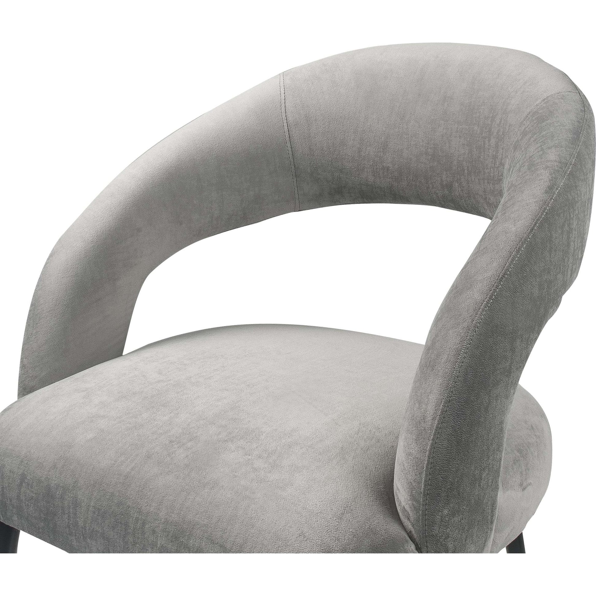 Rocco Dining Chair by TOV Furniture. Made from velvet, pine, stainless steel in a modern style.