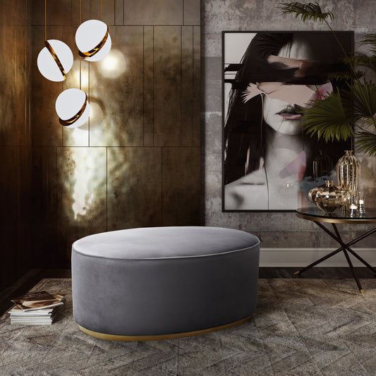 Scarlett Ottoman by TOV Furniture in gray. Made from velvet, wood, stainless steel in a transitional style.