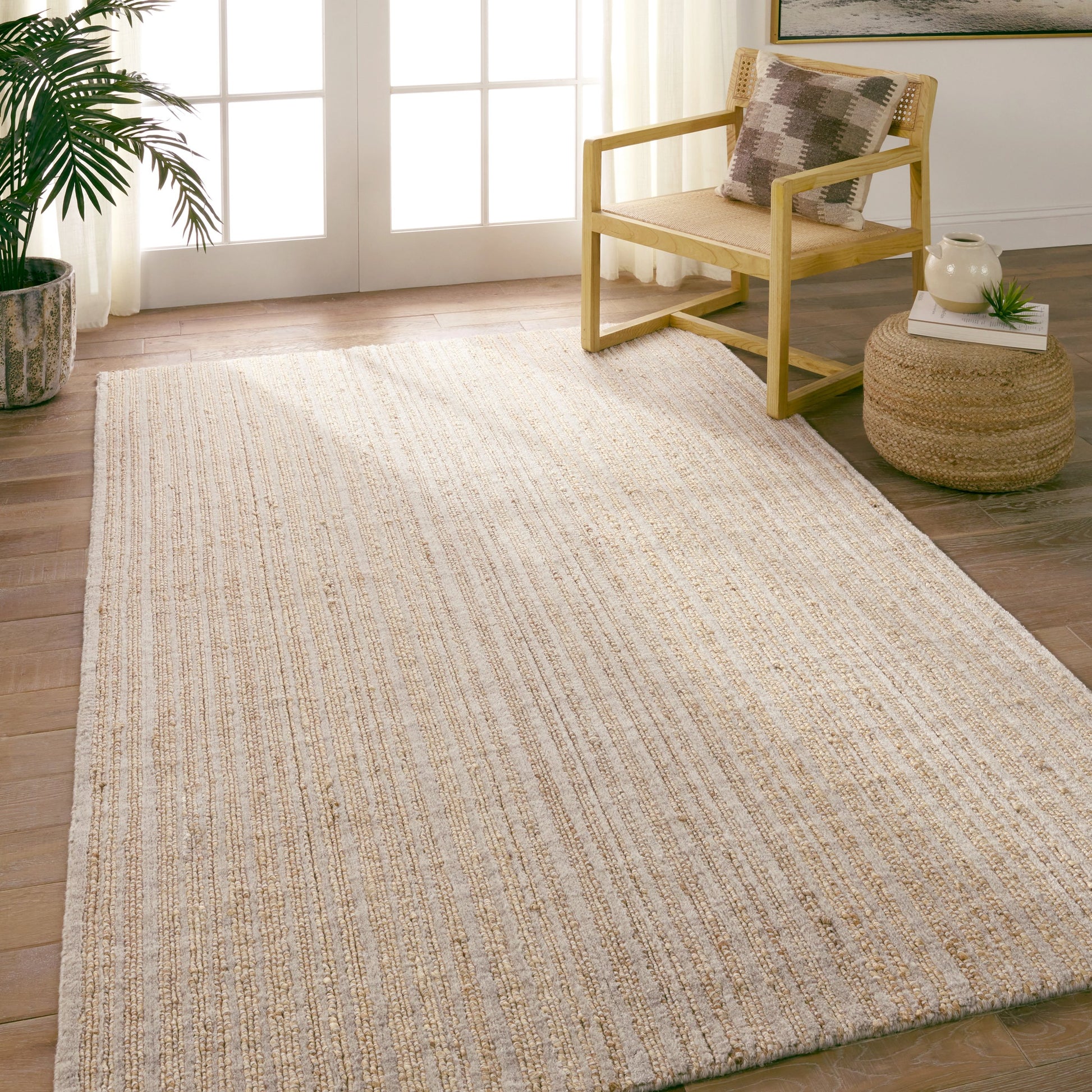 Topo Abdar TPO01 Rug by Jaipur Living in tan, gray. Made from 60% jute, 25% polyester, 10% cotton, 5% wool in a unique style.