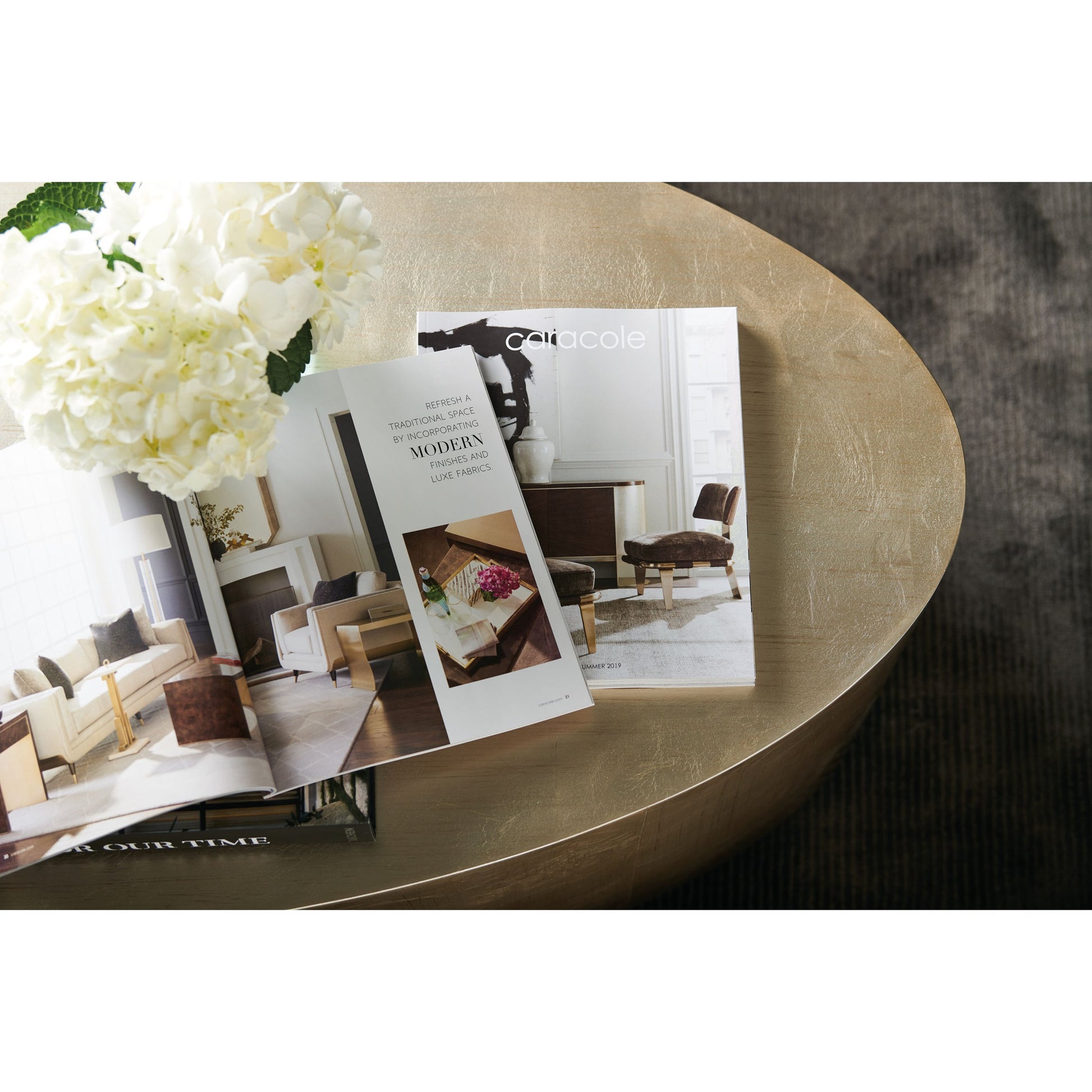 Come Oval Here! Cocktail Table by Caracole in gold, silver and pompeii, charcoal. Made from hardwood solids, hardwood veneers in a modern style.