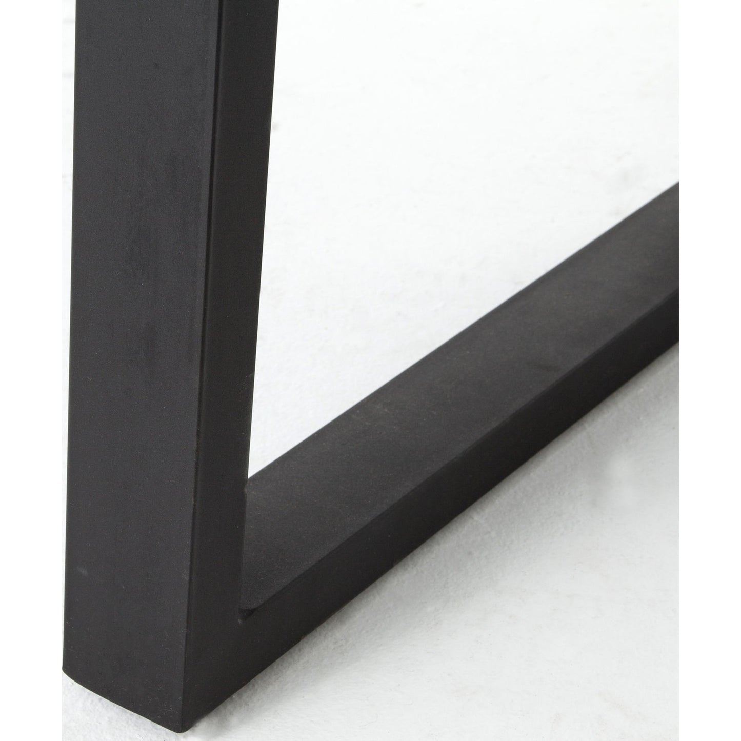 008 S-258305 | Closeup | Cyrus Outdoor Dining Table by Four Hands in black, light gray. Made from lavastone composite, iron in a modern style.