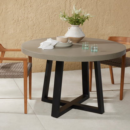 Cyrus Outdoor Round Dining Table by Four Hands. Made from lavastone composite, iron in a modern style.