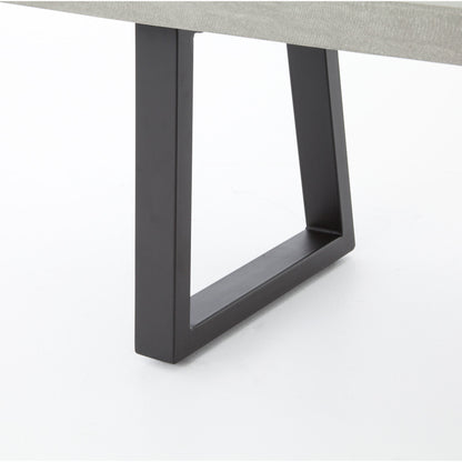 Cyrus Dining Bench by Four Hands in black and grey. Made from lavastone composite, iron in a modern style.