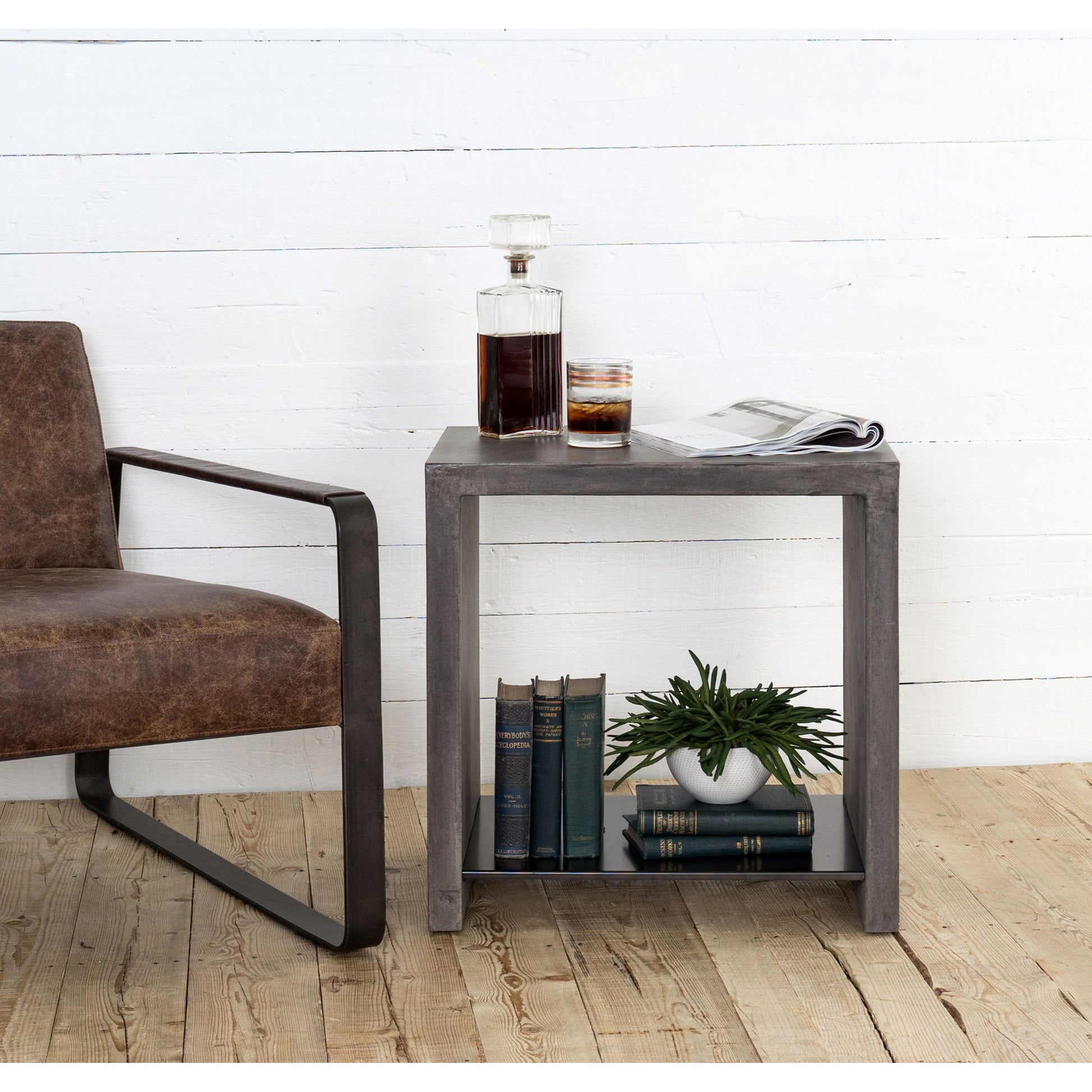Hugo End Table by Four Hands. Made from concrete, iron in a modern style.