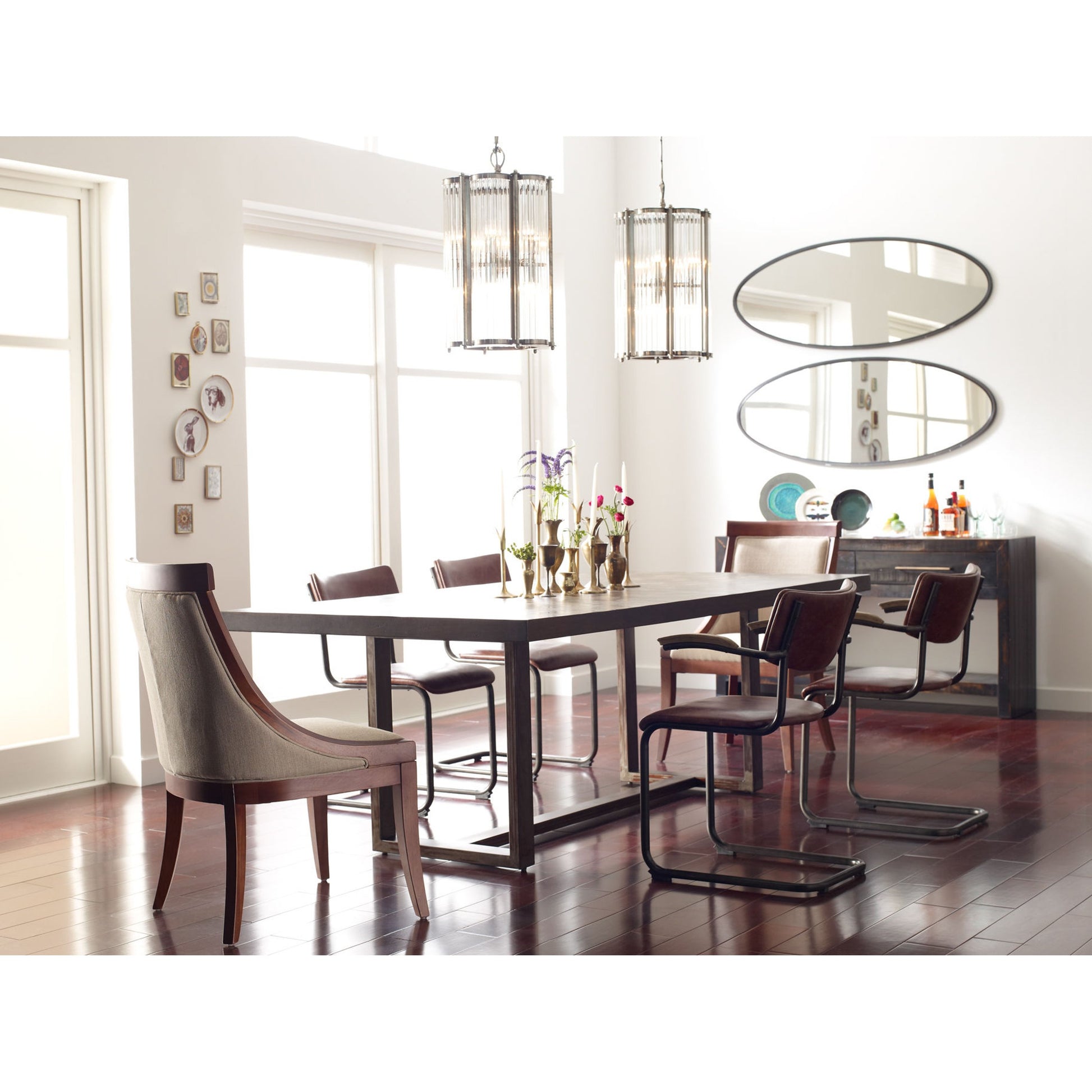Suki Console Table by Four Hands in burnished black. Made from resawn mixed wood in a modern style.