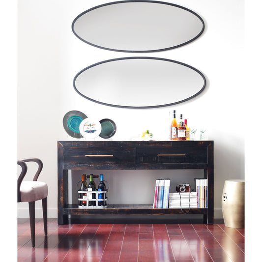 Suki Console Table by Four Hands in burnished black. Made from resawn mixed wood in a modern style.