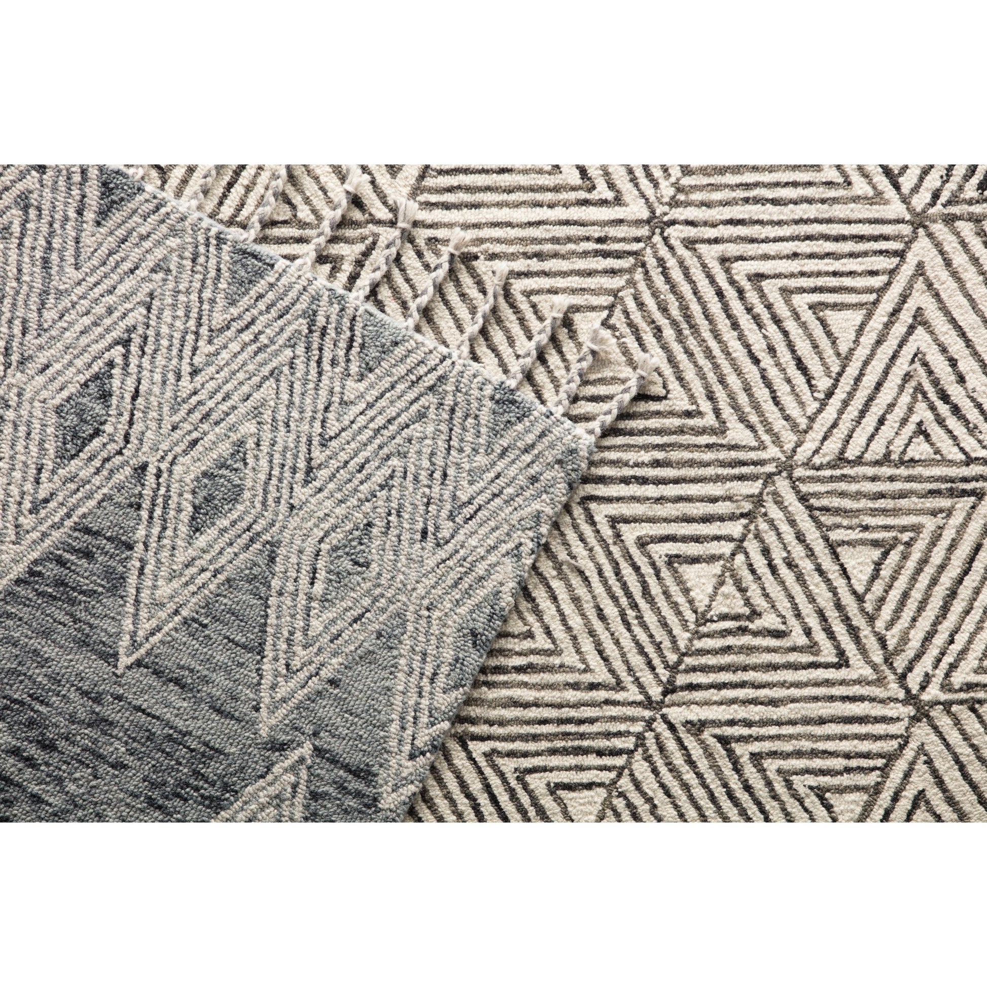 Vera by Nikki Chu VNK01 Rug by Jaipur Living in ivory, gray. Made from 100% wool in a unique style.