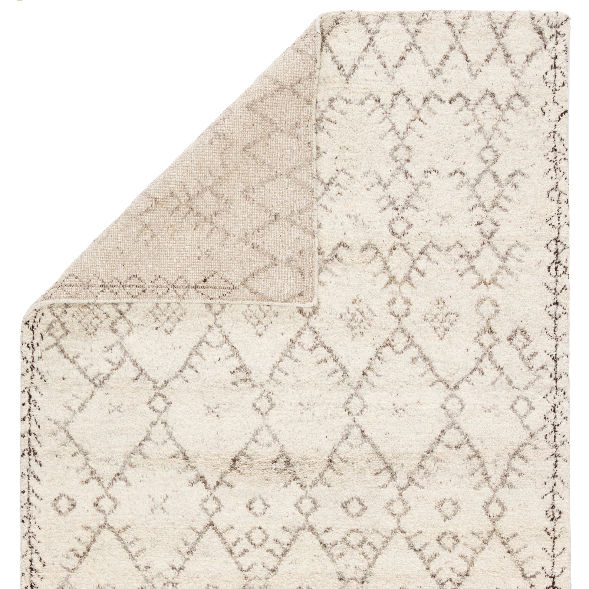 Zuri ZUI01 Rug by Jaipur Living in turtledove, walnut. Made from 100% handspun wool in a unique style.