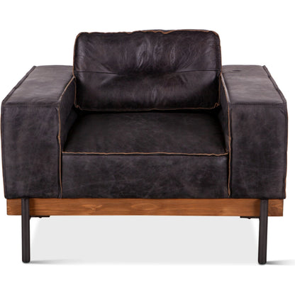 Chiavari Distressed Antique Leather Armchair by World Interiors in black and matte. Made from leather, foam, oak wood, iron in a modern style.