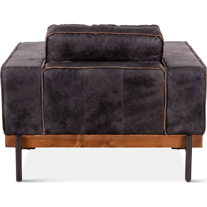 Chiavari Distressed Antique Leather Armchair by World Interiors in black and matte. Made from leather, foam, oak wood, iron in a modern style.