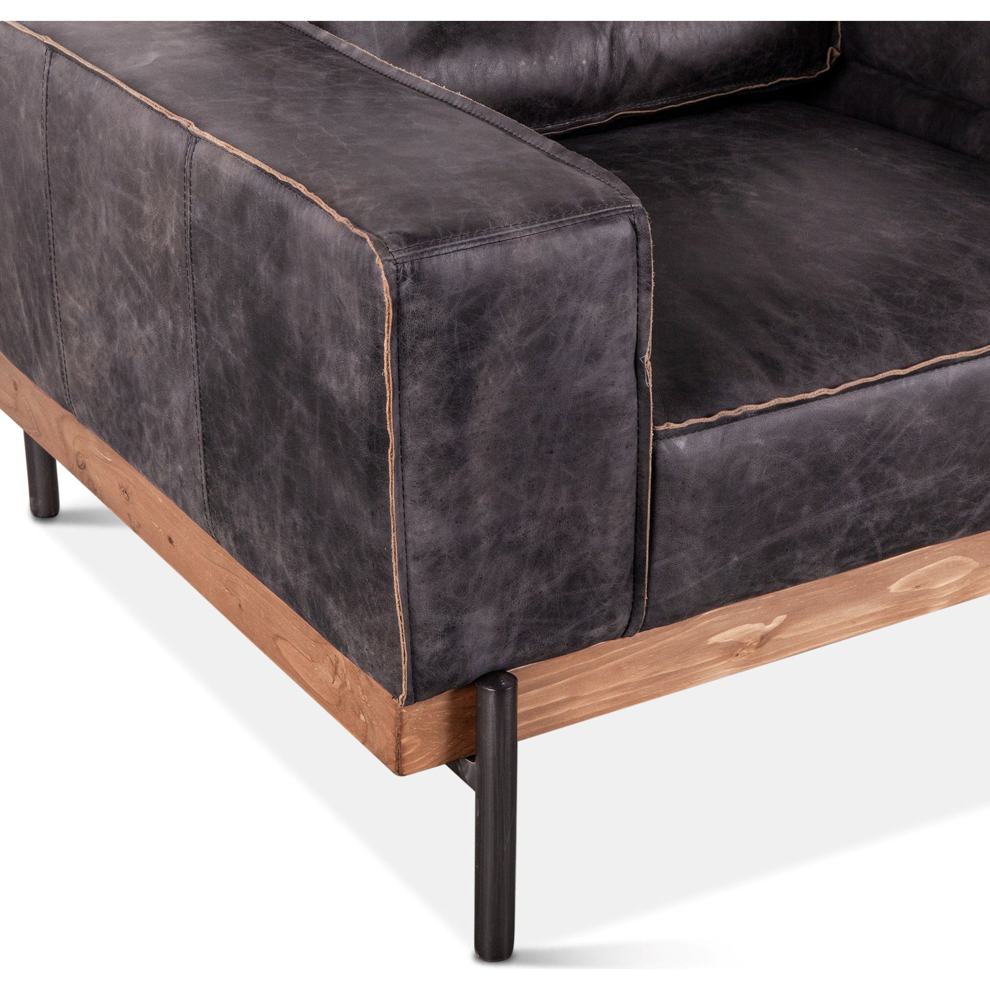 Chiavari Distressed Antique Leather Armchair by World Interiors in black and matte. Made from leather, foam, oak wood, iron in a modern style.