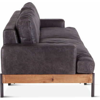 Chiavari Sofa by World Interiors in brown and distressed, antique zinc. Made from leather, iron, oak wood in a modern style.