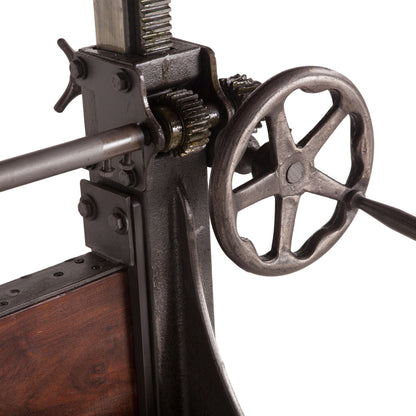 Welles Adjustable Dining Table by World Interiors in brown and weathered russet, gunmetal. Made from teak wood, cast iron in a modern style.