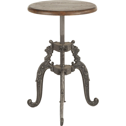 Regina Adjustable Stool by World Interiors in brown and weathered gray. Made from cast iron, teak in a modern style.