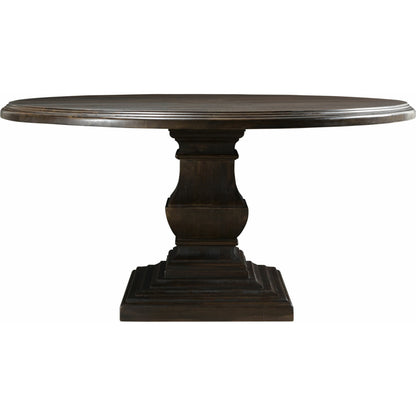 Toulon Round Dining Table by World Interiors in dark brown and vintage brown. Made from mango wood in a transitional style.