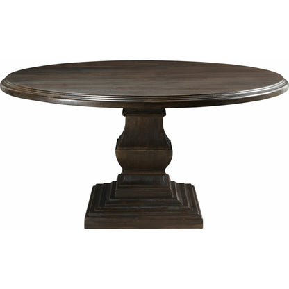 Toulon Round Dining Table by World Interiors in dark brown and vintage brown. Made from mango wood in a transitional style.