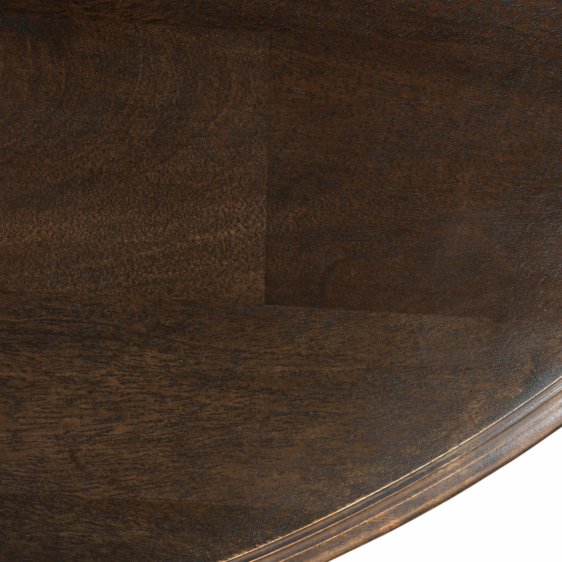 Toulon Round Dining Table by World Interiors in dark brown and vintage brown. Made from mango wood in a transitional style.