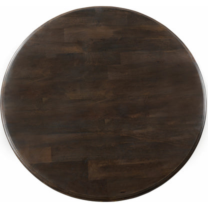 Toulon Round Dining Table by World Interiors in dark brown and vintage brown. Made from mango wood in a transitional style.