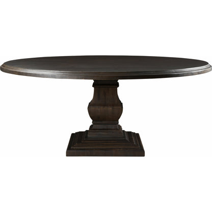 Toulon Round Dining Table by World Interiors in dark brown and vintage brown. Made from mango wood in a transitional style.