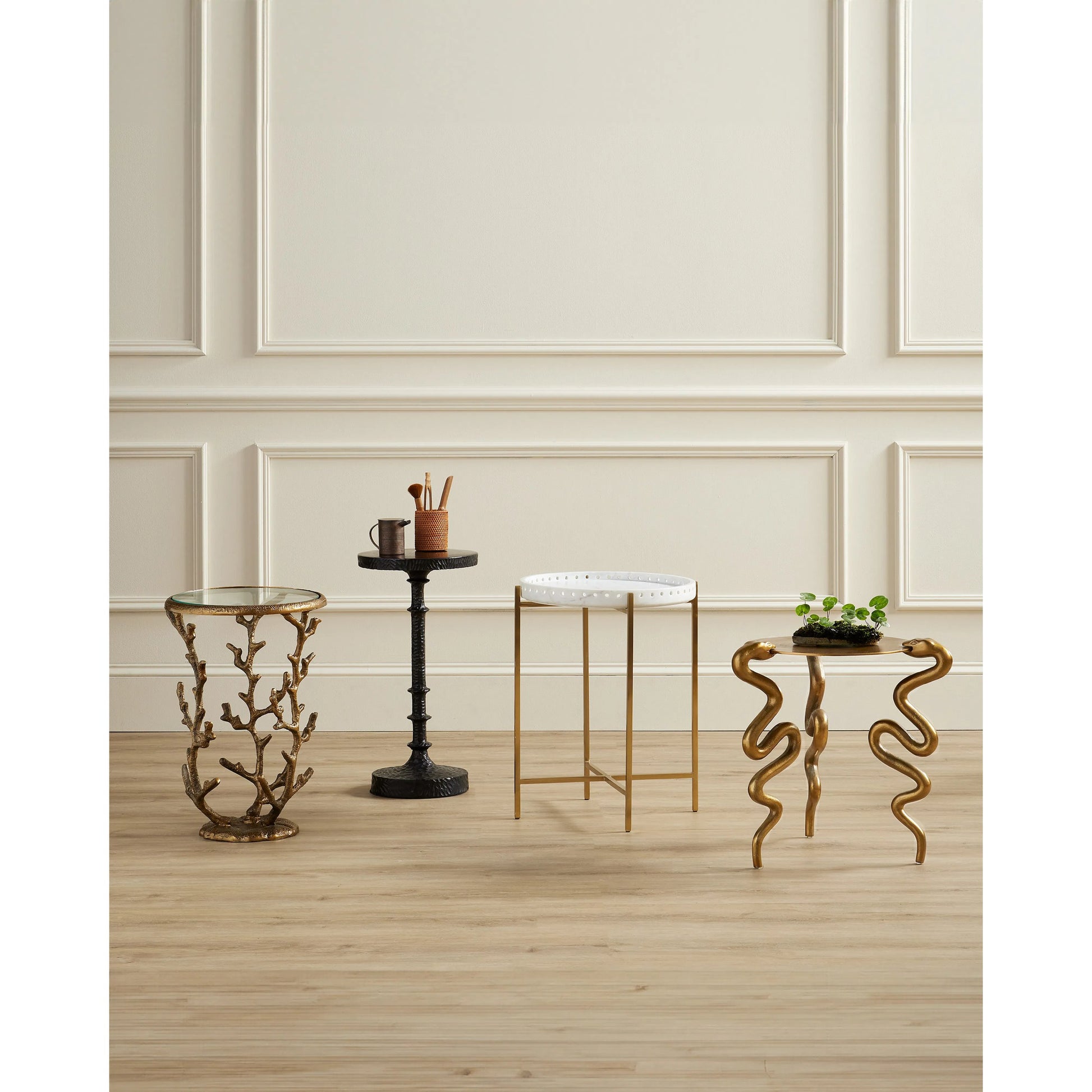 Gallo Accent Table by Currey and Company in bronze. Made from cast aluminum in a modern style.