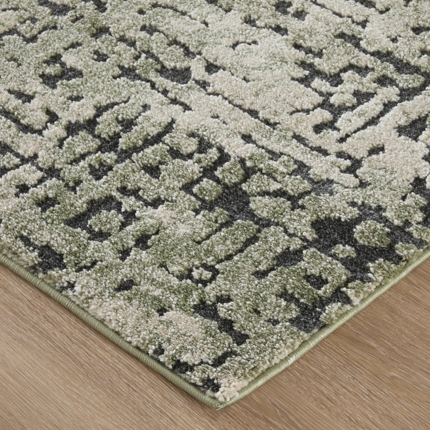 001 SI-2635517,SI-2635518,SI-2635519,SI-2635520,SI-2635521 | Closeup | Gilmore GIL39UNF Rug by Feizy in green, ivory, black. Made from polypropylene in a unique style.