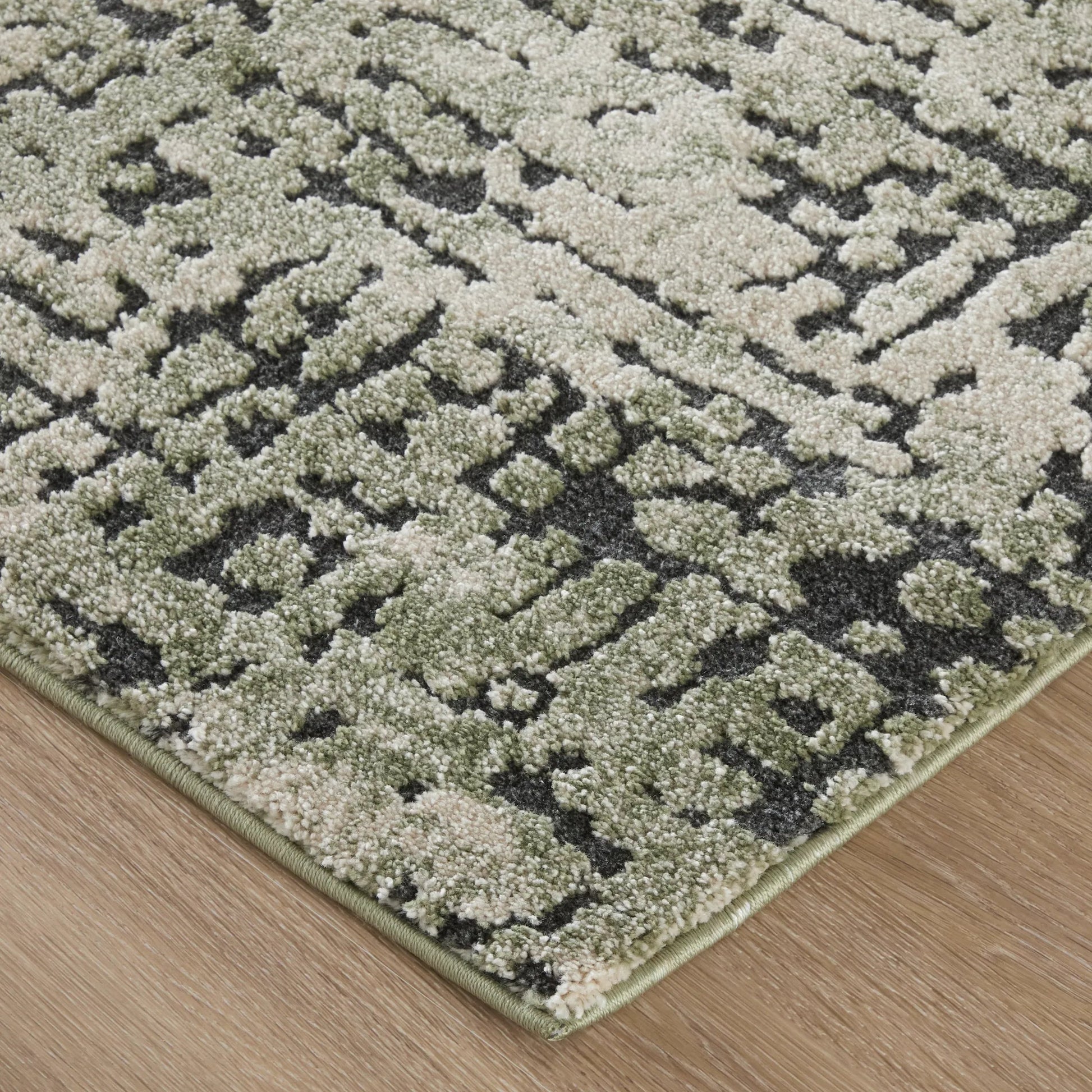 Gilmore GIL39UNF Rug by Feizy in green, ivory, black. Made from polypropylene in a unique style.