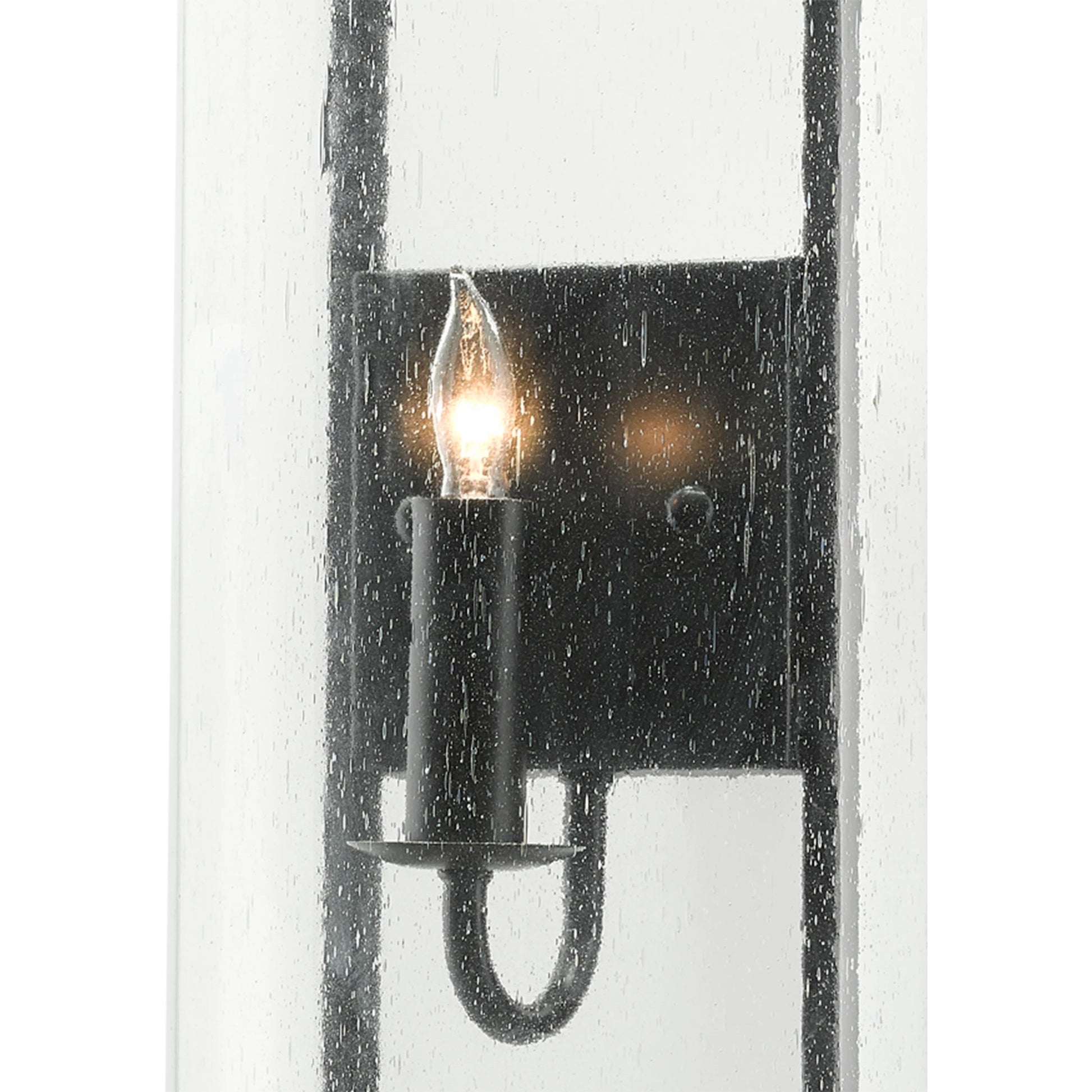 Breakspear Wall Sconce by Currey and Company in antique black. Made from metal, seeded glass in a transitional style.